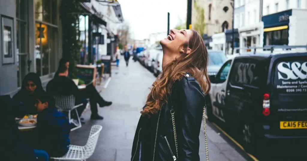 Light Feminine Energy: 7 Tips to Embrace Your Inner Strength 12 woman in the streets with light feminine energy
